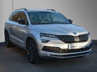 gebraucht Skoda Karoq 2.0TSI 4x4 Sportline ACC EINPARKH CANTON PANO KAMERA LED NAVI SITZH