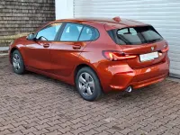 Gebraucht BMW 116 Advantage 109 PS (80 kW) 2024 Sunset orange metallic Kleinwagen