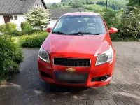Gebraucht Chevrolet Aveo 85 PS (62 kW) 2010 Rot Limousine