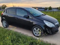 Używany Opel Corsa 69 KM (50 kW) 2012 Czarny Hatchback