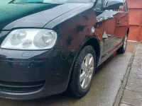 Używany VW Touran 105 KM (77 kW) 2006 Czarny Minivan