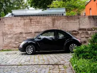 Gebraucht VW New Beetle 102 PS (75 kW) 2006 Schwarz Kleinwagen