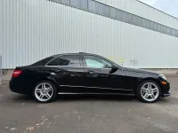 Używany Mercedes E500 AMG 388 KM (285 kW) 2011 Czarny Sedan/Limuzyna