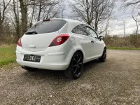 Używany Opel Corsa Selection 69 KM (50 kW) 2012 Biały Hatchback