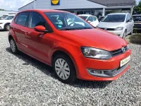 Gebraucht VW Polo Team 69 PS (50 kW) 2010 Hot orange metallic Kleinwagen