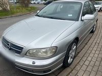 Second-hand Opel Omega 170 CP (125 kW) 2000 Argintiu Berlinǎ