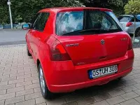 Używany Suzuki Swift 92 KM (67 kW) 2005 Czerwony Hatchback