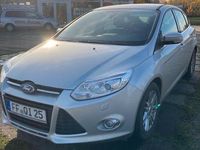 Second-hand Ford Focus Trend 101 CP (74 kW) 2012 Argintiu Berlinǎ
