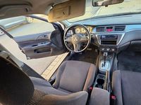 Gebraucht Mitsubishi Lancer Invite 98 PS (72 kW) 2006 Schwarz Kombi