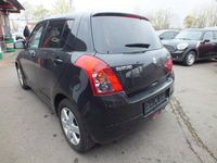 Second-hand Suzuki Swift 92 CP (67 kW) 2010 Negru Hatchback