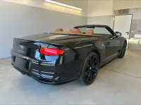 Gebraucht Bentley Continental 659 PS (484 kW) 2024 Midnight emerald / verdeck schwarz Coupé