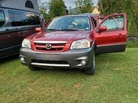 Second-hand Mazda Tribute 150 CP (110 kW) 2006 Roșu SUV