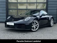 Gebraucht Porsche 911 Carrera 394 PS (289 kW) 2025 Tiefschwarzmetallic Coupé