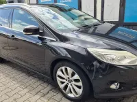 Gebraucht Ford Focus Titanium 140 PS (102 kW) 2011 Pantherschwarz metallic Kombi