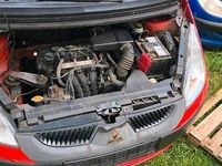 Second-hand Mitsubishi Colt 75 CP (55 kW) 2007 Roșu Hatchback