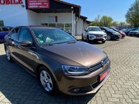 Używany VW Jetta Highline 122 KM (89 kW) 2012 Brązowy Sedan/Limuzyna