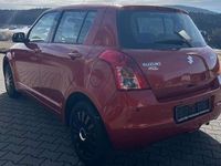 Gebraucht Suzuki Swift 92 PS (67 kW) 2008 Orange/braunmet. Kleinwagen