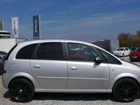 Second-hand Opel Meriva 90 CP (66 kW) 2010 Argintiu Monovolum
