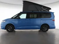 Gebraucht VW T7 Beach 245 PS (180 kW) 2026 Medium blue / deep black perleff Van