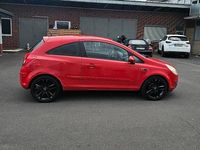 Gebraucht Opel Corsa 80 PS (58 kW) 2007 Magma rot (b) Kleinwagen