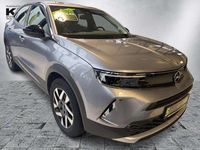 Gebraucht Opel Mokka-e Elegance 100 kW (136 PS) 2022 Kontrast grau/quarz silber SUV