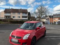Second-hand Suzuki Swift 92 CP (67 kW) 2009 Roșu Hatchback