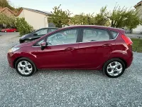 Usata Ford Fiesta Titanium 97 CV (71 kW) 2009 Rosso Utilitaria
