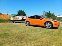Gebraucht Tesla Model Y 255 kW (347 PS) 2023 Orange SUV