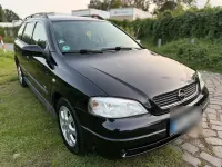 Używany Opel Astra Njoy 101 KM (74 kW) 2003 Czarny Sedan/Limuzyna