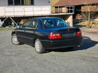 Gebraucht Mitsubishi Carisma 100 PS (73 kW) 2001 Schwarz Limousine