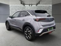 Gebraucht Opel Mokka-e Elegance 100 kW (136 PS) 2022 Kontrast grau/quarz silber SUV