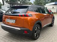 Gebraucht Peugeot e-2008 GT 100 kW (136 PS) 2021 Orange fusion (metallic) SUV