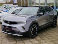 Gebraucht Opel Mokka-e Ultimate 100 kW (136 PS) 2023 Kontrast grau SUV