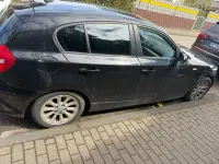 Second-hand BMW 116 122 CP (89 kW) 2009 Negru Hatchback