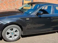 Second-hand BMW 116 116 CP (85 kW) 2010 Negru Hatchback