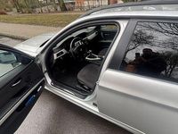 Second-hand BMW 318 143 CP (105 kW) 2009 Argintiu Break