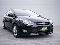 Gebraucht Ford Focus Champions Edition 125 PS (91 kW) 2013 Pantherschwarz metallic Kombi