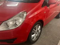 Gebraucht Opel Corsa 80 PS (58 kW) 2009 Rot Kleinwagen