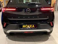 Gebraucht Opel Mokka-e Elegance 100 kW (136 PS) 2023 Karbon schwarz (metallic) SUV