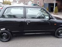 Gebraucht Daihatsu Cuore 56 PS (41 kW) 1999 Schwarz Kleinwagen