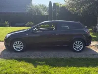 Używany Opel Astra GTC Edition 105 KM (77 kW) 2007 Czarny Sedan/Limuzyna
