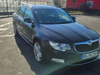 Używany Skoda Superb 170 KM (125 kW) 2012 Czarny Kombi