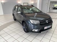 gebraucht Dacia Logan II Kombi 1.0 Stepway Celebration *ALLWETTER*NAVI*TEMPOMAT*PDC*