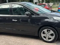 Gebraucht Renault Grand Scénic III 131 PS (96 kW) 2010 Schwarz Van / Kleinbus