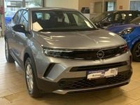 Gebraucht Opel Mokka-e Edition 100 kW (136 PS) 2023 Grau kontrast grau/quarz silber (metallic) SUV