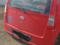 Gebraucht Daihatsu Cuore 58 PS (42 kW) 2006 Rot Kleinwagen