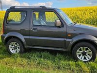 Second-hand Suzuki Jimny Style 86 CP (63 kW) 2011 Gri SUV