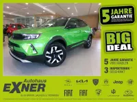 Gebraucht Opel Mokka Elegance 136 PS (100 kW) 2023 Matcha green / dach schwarz SUV