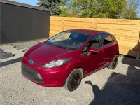 Gebraucht Ford Fiesta 60 PS (44 kW) 2010 Rot Kleinwagen