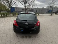 Używany Opel Corsa 69 KM (50 kW) 2013 Czarny Hatchback